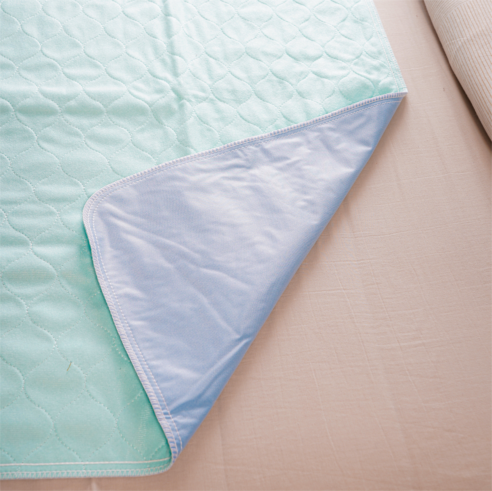 wasbare bed onderlegger 85 x 90 cm aidapt